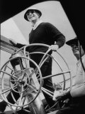 Skipper Emil Mosbacher Operating at the Helm, 5 Wheels of Intrepid During the America's Cup Trials