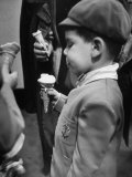 Buy Boy Eating Ice Cream Cone at the Circus in Madison Square Garden at AllPosters.com