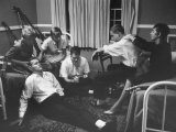 Kingston Trio Relaxing with their Wives before a Concert: Bob Shane, Dave Guard, and Nick Reynolds