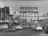Cars Driving Through City