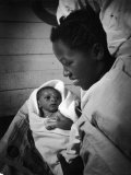 Buy Nurse-Midwife Maude Callen Shows Smiling Alice Her Newborn Son at AllPosters.com