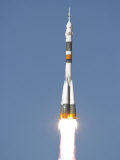 Buy Soyuz TMA-12 Spacecraft Lifts Off into a Cloudless Sky at AllPosters.com
