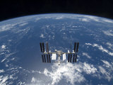 International Space Station Backdropped by a Blue and White Earth