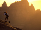 Woman Runs Up a Red Rock Slope, Sedona, Arizona, United States