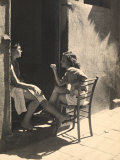 Two Girls Sitting on a Doorstep