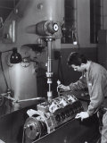 Worker Operating a Machine in the Ferrari Factory