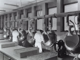 Buy Workers Operating Machinery at the Recordati Pharmaceutical Factory at AllPosters.com
