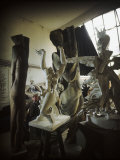 Russian Sculptor Ossip Zadkine Sitting in His Paris Studio Among Towering Sculptures