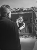 Cartoonist Charles Addams Experimenting with Scary Faces for His Cartoon, The Addams Family