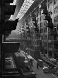 Buy Off-Loaded Freight From Box Cars Being Hoisted Up to Jutting Loading Platforms, Brooklyn Army Base at AllPosters.com