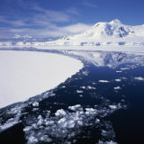 Buy Reflections in Icy Sea of Snow Covered Mountain, West Coast of the Antarctic Peninsula, Antarctica at AllPosters.com