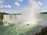 Buy Maid of the Mist Tour Boat under the Horseshoe Falls Waterfall at Niagara Falls, Ontario, Canada at AllPosters.com