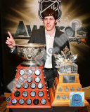 Evgeni Malkin with the Art Ross Trophy and Conn Smythe Trophy