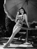 Buy Ann Miller Eating Ice Cream, c.1941 at AllPosters.com