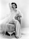 Buy Jeanne Crain Posing in a Negligee, 1957 at AllPosters.com