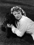 Buy Greer Garson Posing with French Poodle, Coco, 1939 at AllPosters.com