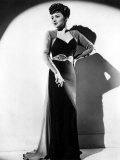 Buy Olivia De Havilland in a Black Crepe Evening Gown, 1941 at AllPosters.com