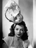 Buy Jane Greer, Modeling an Enterprising Easter Bonnet, 1947 at AllPosters.com