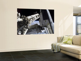 Buy Space Shuttle Discovery Docked to the International Space Station at AllPosters.com