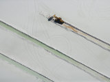 Buy Plowing lithium fields at the edge of the Salar de Atacama at AllPosters.com