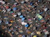 Buy Sunbathers blanket the shore of Lake Villarica at AllPosters.com