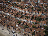 Buy Densely packed neighborhood with traditional tile roofs at AllPosters.com