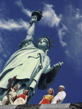 Buy The Statue of Liberty stands tall in New York Harbor at AllPosters.com