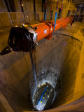 A superconducting magnet is lowered into the particle collider