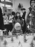 Little Boy Looking at Train Set in Moscow Department Store