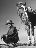 Man Sitting Holding His Horses Reins