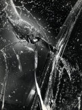 Buy Stop-Action Photograph of Splashes and Bubbles Caused by Knife Moving Rapidly Through Water at AllPosters.com