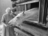 Mrs. Mary Breckenridge Runs the Frontier Nursing Service, Petting Her Horse