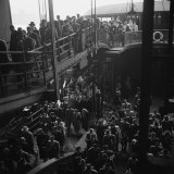 Buy Ferry Boat Commuters from Staten Island Disembarking at Ferry Slip in Manhattan at AllPosters.com