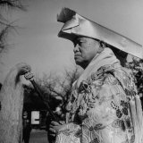 Man Dressed in Traditional Costume Attending a Bean Throwing Festival on New Years Eve