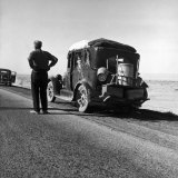Buy Oakie Family Stalled on Desolate Track of Highway in Desert in Southern California at AllPosters.com