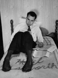Buy Vice Presidential Candidate Richard M. Nixon Sitting on His Hotel Bed Reviewing Paperwork at AllPosters.com