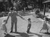Buy Father Playing in Yard with His Children at AllPosters.com