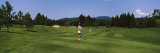 Woman Playing Golf, Idaho, USA