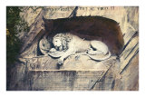 Lion Carved Out of Rock Face