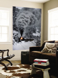 A Train Chugs Through the Snow Blanketing the San Juan Mountains