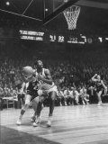 Buy Univ. of Cincinnati Team Captain, Oscar Robertson During Game with Iowa University at AllPosters.com