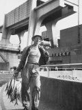Construction Worker Going Home with a Rack Full of Fish That He Caught