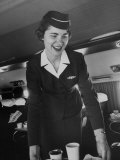 Airline Stewardess Seving Coffee
