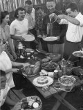 Buy Young Married Couples Enjoying a Backyard Buffet Feast , Featuring Spaghetti at AllPosters.com