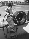 Expert Mechanic Waiting for a Car to Stop During the Daytona 500 Autorace