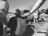 Expert Mechanics Making Repairs on a Car During the Daytona 500 Race