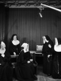 Group of Nuns Wearing Seven Dwarf Masks and Performing under the Large Boom Microphone