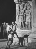 Russian Olympic Runner Rests on Constantines Arch, after Placing 4th in Marathon