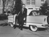 Buy President of American Motors George W. Romney Getting Out of His Car at AllPosters.com