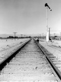 Itinerant Men, Aka. Hoboes, Waiting W. their "Bindles" to Illegally Hop Aboard a Freight Train
